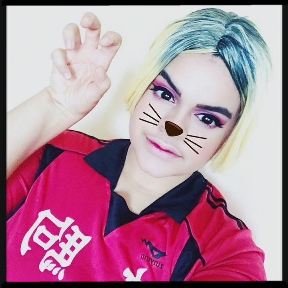 Mya in 2018 with cat whiskers added to a favorite cosplay character